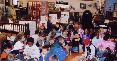 Children seated on the floor at the Museum.